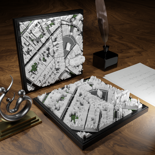3D-geprinte miniatuur van Gouda stad, beschikbaar in 20 verschillende versies, met gedetailleerde weergave. Verkrijgbaar in een stijlvolle plexiglas kubus of in een ophangbaar frame. Perfect als handgemaakte decoratie voor liefhebbers van Gouda, met keuze tussen een ingelijst ontwerp of een moderne plexi cube.