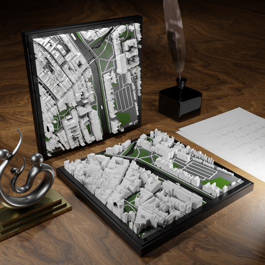3D-geprinte miniatuur van Gouda stad, beschikbaar in 20 verschillende versies, met gedetailleerde weergave. Verkrijgbaar in een stijlvolle plexiglas kubus of in een ophangbaar frame. Perfect als handgemaakte decoratie voor liefhebbers van Gouda, met keuze tussen een ingelijst ontwerp of een moderne plexi cube.